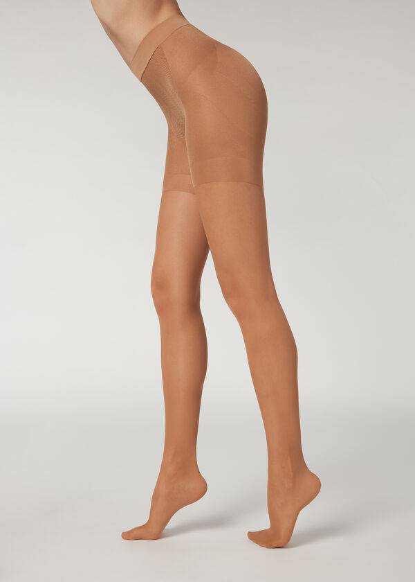 dámské béžovo-hnědé stahující legíny calzedonia 30 denier total shaper