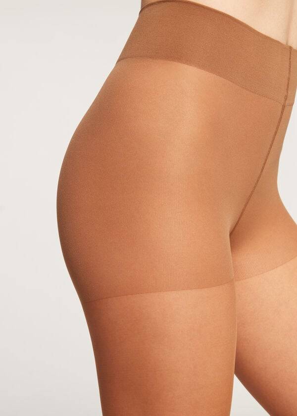 hnědé dámské průsvitné legíny calzedonia 40 denier action medium