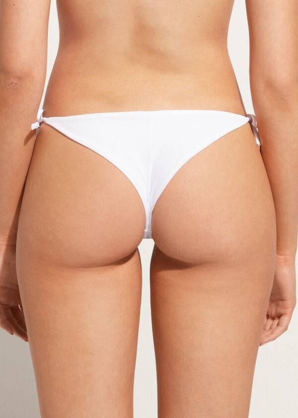 dámské bílé bikinové kalhotky calzedonia s kamínky a brazilským stringem shanghai