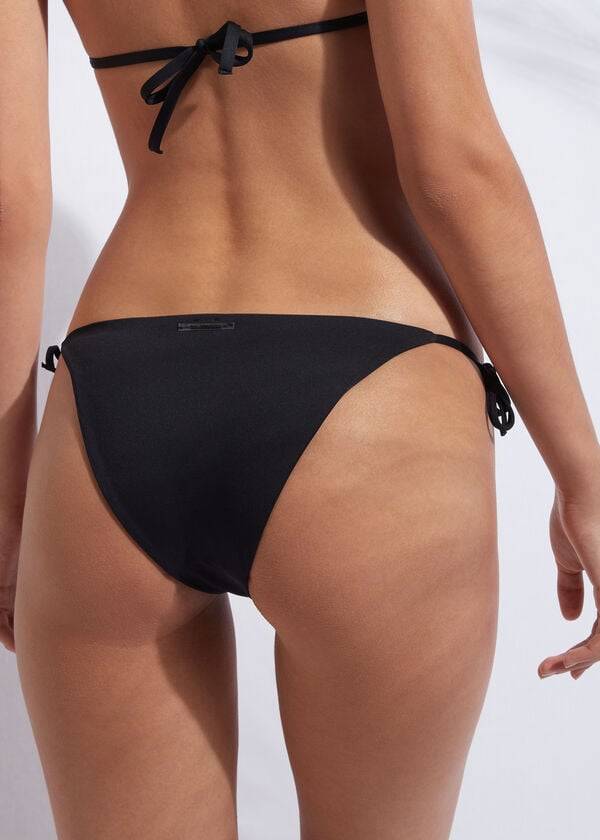 Černé dámské bikinové kalhotky calzedonia string indonesia
